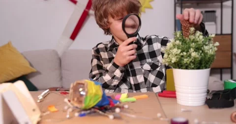 Young engineer. Boy passionate about electronics. DIY kid. Inventions and Stock Footage 172566299