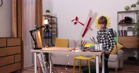 Young engineer. Boy passionate about electronics. DIY kid. Inventions and Stock Footage 172566866