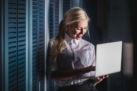 Young engineer businesswoman in server room Stock Photos