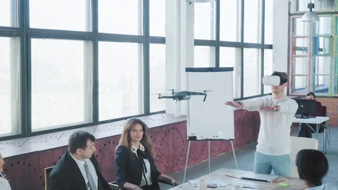 A young engineer controls the drone using hand gestures and virtual glasses Stock Footage 108184759