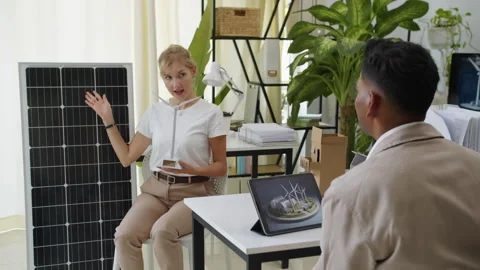 Young Engineer Demonstrating Methods of Alternative Energy Implementation Stock Footage 276886504