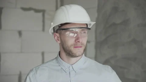  Young engineer with drawings shows like Video stock 133073762