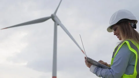 A young engineer explores the possibilities of using wind energy on the Stock-Footage 275189881