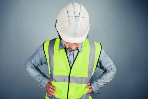 Young engineer looking down Foto stock