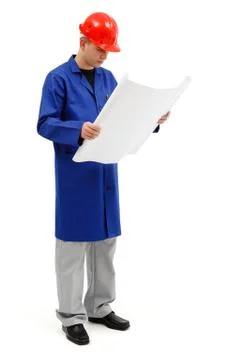 Young engineer looking at project plans Stock-Fotos