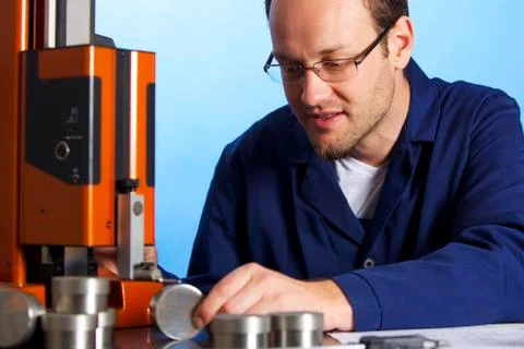 Young engineer measuring Stock Photos