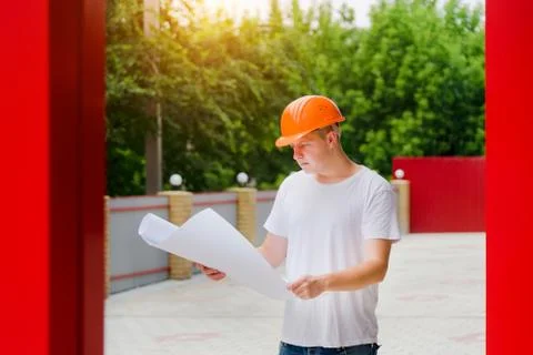 Young Engineer Outdoor Hold Plan Stock Photos