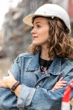 Young engineer posing with folded arms 스톡 사진