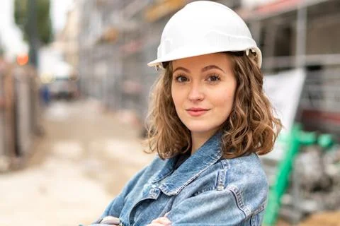 Young engineer posing with folded arms Stock Photos