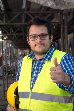 Young engineer posing with thumbs up Stock Photos