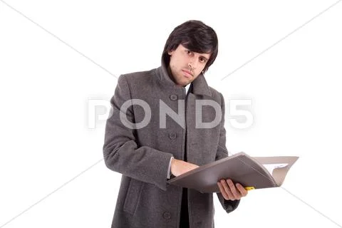 Young engineer, reading a plan Stock Photos