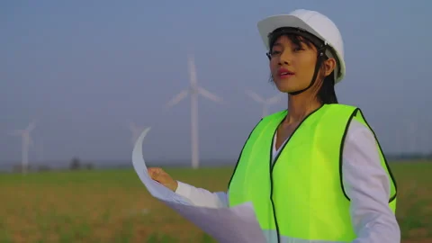 The young engineer studied the blueprints intently. Stock Footage 240482906