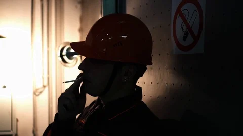 A young engineer is in a technical room. at the factory. no smoke Stock Footage 105607002