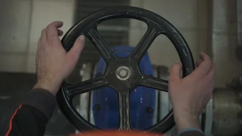 A young engineer is in a technical room. at the factory Stock Footage 105607183