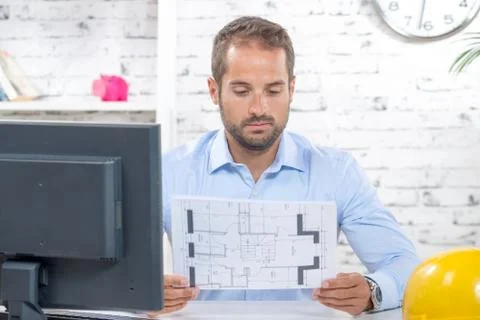 Young engineer working on his computer Stock Photos
