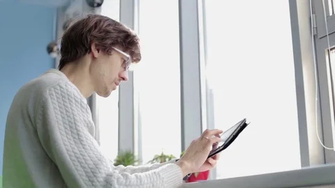 Young Engineer Works with the Drawings on the Tablet Stock Footage 71427299