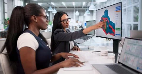 Young Engineers Collaborate On Laptop To Develop Innovative 3D Product Design Stock Photos
