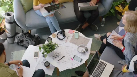 Young engineers developing fitness app software using digital tablet computer Stock Footage 96890055