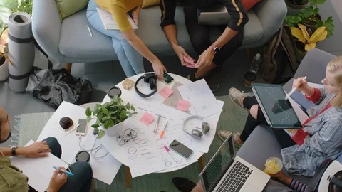 Young engineers developing fitness app software using digital tablet computer Stock Footage 96890171