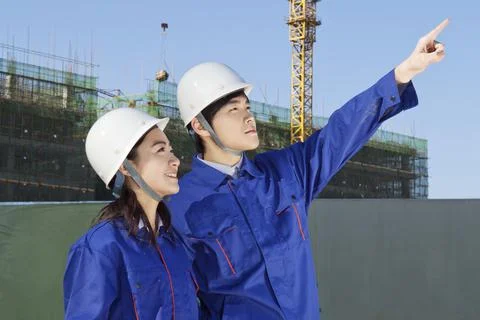 The Young Engineers working at construction field Stock Photos