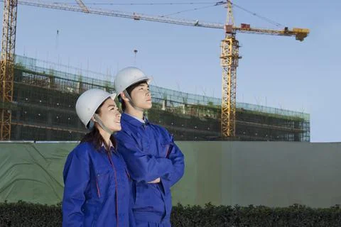 The Young Engineers working at construction field Stock Photos