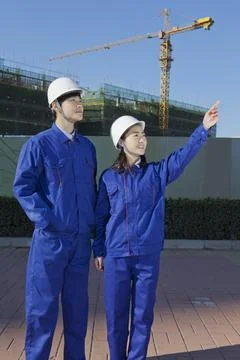 The Young Engineers working at construction field Stock Photos