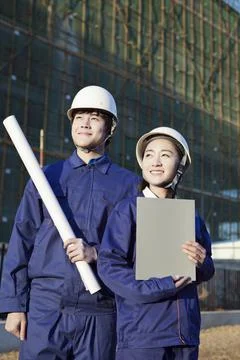 The Young Engineers working at construction field Stock Photos