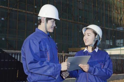 The Young Engineers working at construction field Stock Photos