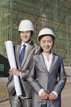 The Young Engineers working at construction field Stock Photos