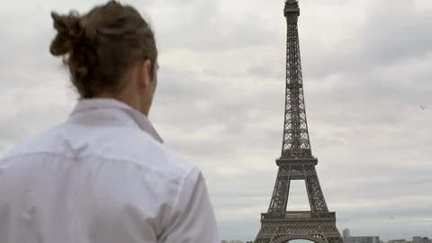 Young entrepreneur opens a door to the Eiffel tower in Paris France Stock Footage 85677522