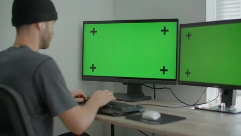Young entrepreneur working on computer, green screen mockup 库存影片 218466945