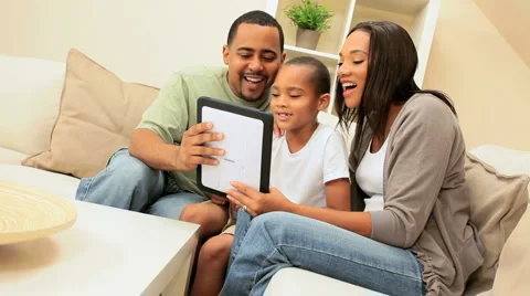 Young Ethnic Family Using Interactive Webchat Stock Footage 4279664