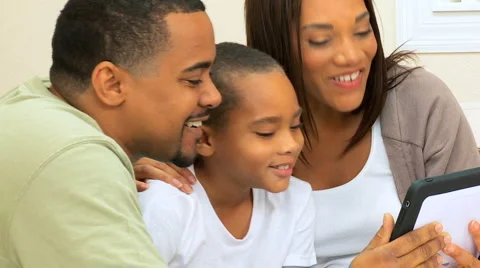 Young Ethnic Family Using Interactive Webchat Stock Footage 4579162