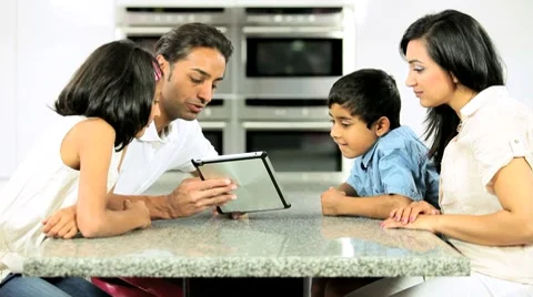 Young Ethnic Family Using Laptop for Webchat Stock Footage