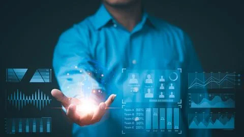 The young executive is managing the resources and personnel of the corporat.. Stock Photos