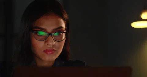 Young executive working on a presentation late at night	 Stock Footage 138859857