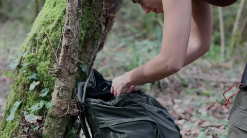 Young Explorer girl Retrieving First Aid Kit in 4K Stock Footage 265768655
