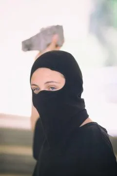 Young extremist throws a stone Stock Photos