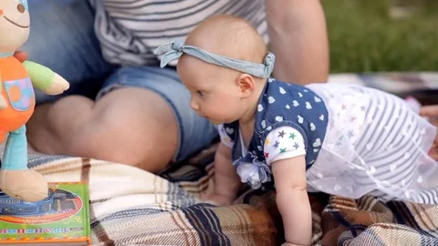 Young family with a child at a picnic in the Park Stock Footage