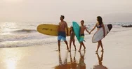 Young Family Going Surfing Stock Footage