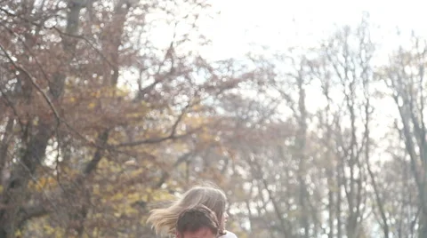 Young family having fun together in the park Stock Footage 59553725