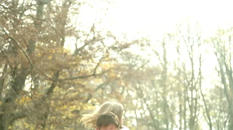 Young family having fun together in the park Stock Footage 59553729