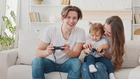 Young family play online video game Stock Video Pond5