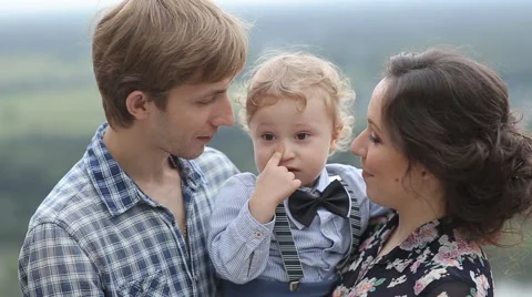 Young Family Playing in The Park Stock Footage 60950053