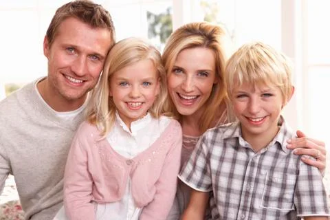 Young family pose together Stock Photos