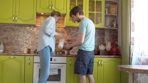 Young family preparing blini Stock Footage 128915752