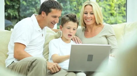 Young Family Using Laptop for Webchat Stock Footage 8826595