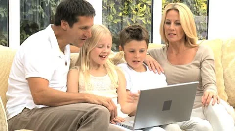 Young Family Using Laptop for Webchat Stock Footage 8875215