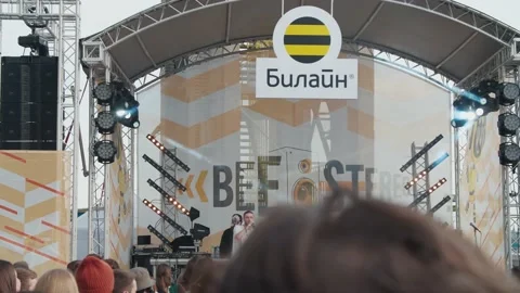 Young fans dance in front of the stage, enjoying music at the Stereoleto Summer Stock Footage 167363040
