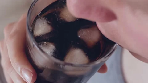 Young fat caucassian man drinks refreshing soda drink Stock Footage 130797679